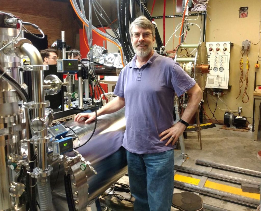 Professor Brian Nelson Standing by Their fusion Z-pinch Experiment (FuZE)